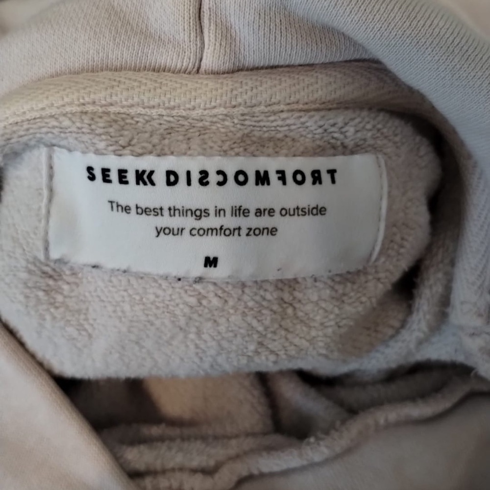 Seek Discomfort Cream Hoodie